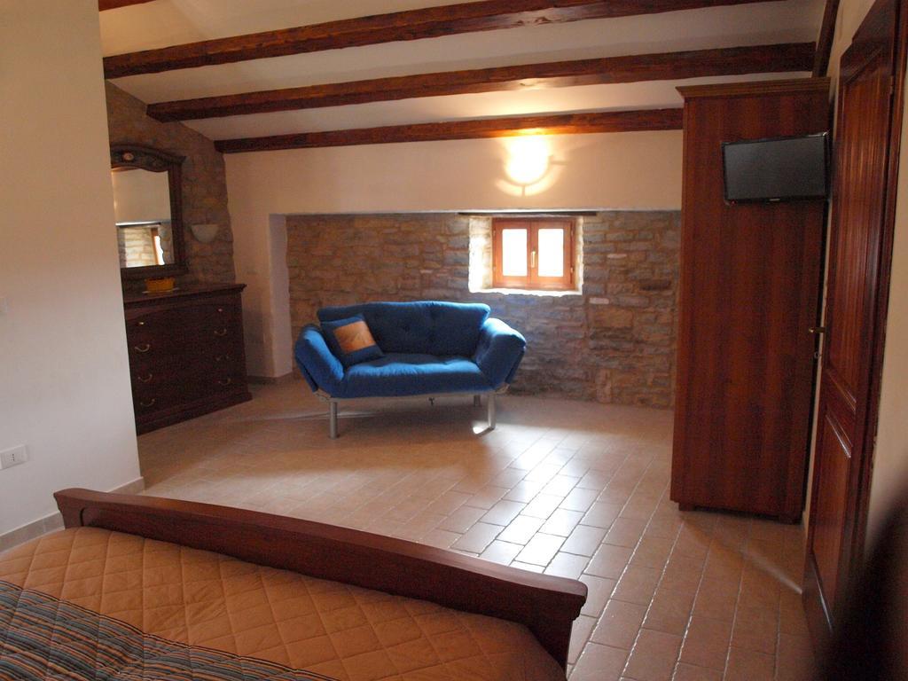 Al Merlo Olivo, Rural Istrian House Buje Bagian luar foto