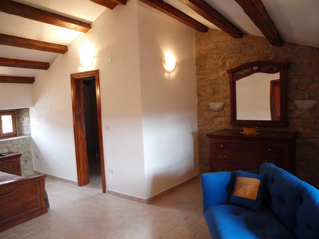 Al Merlo Olivo, Rural Istrian House Buje Bagian luar foto